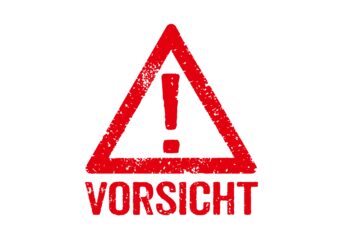 Rotes Ausrufungszeichen mit dem Hinweis "Vorsicht" darunter.